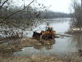 Mankato district, front loader in water