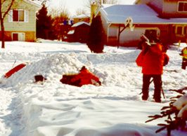 Children Playing in a Snowbank