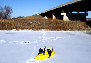 2 searchers on frozen river
