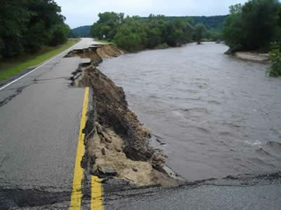 Half of road washed away