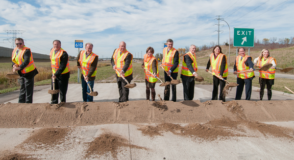 Photo of local and state leaders at Hwy 610 groundbreaking.