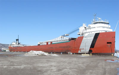 The John G. Munson freight ship docked in winter 