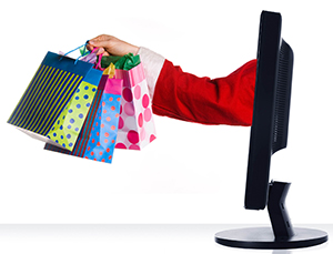 Graphic of a arm with presents coming out of a computer monitor.