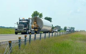 Photo of a truck on two lane highway.