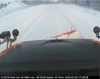 Photo from a dash camera in a snowplow.