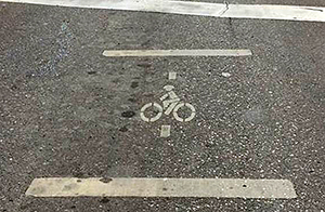 Photo of a bicycle marking on the road.