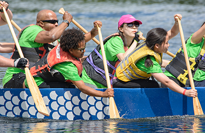 Photo of MnDOT employees participating in Dragon Boat Race.
