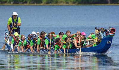 Photo of MnDOT employees participating in Dragon Boat Race.